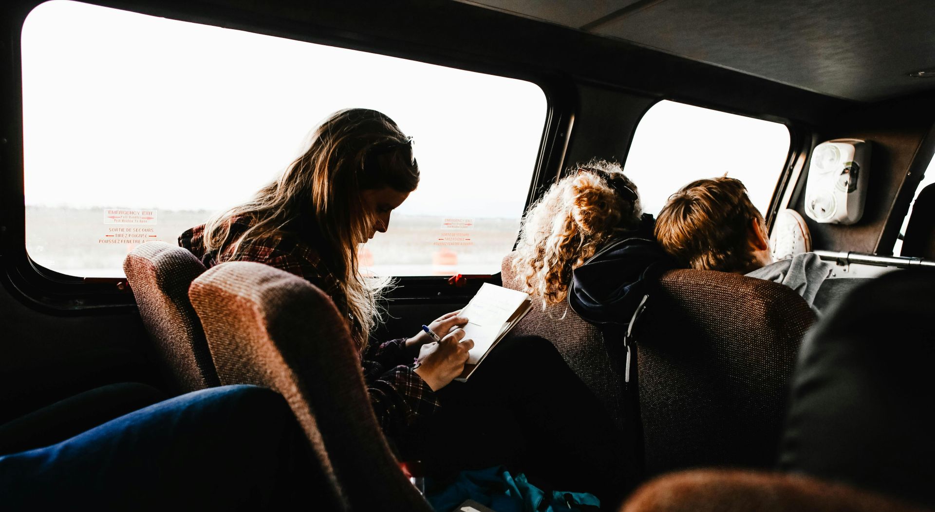 People Sitting in a Van